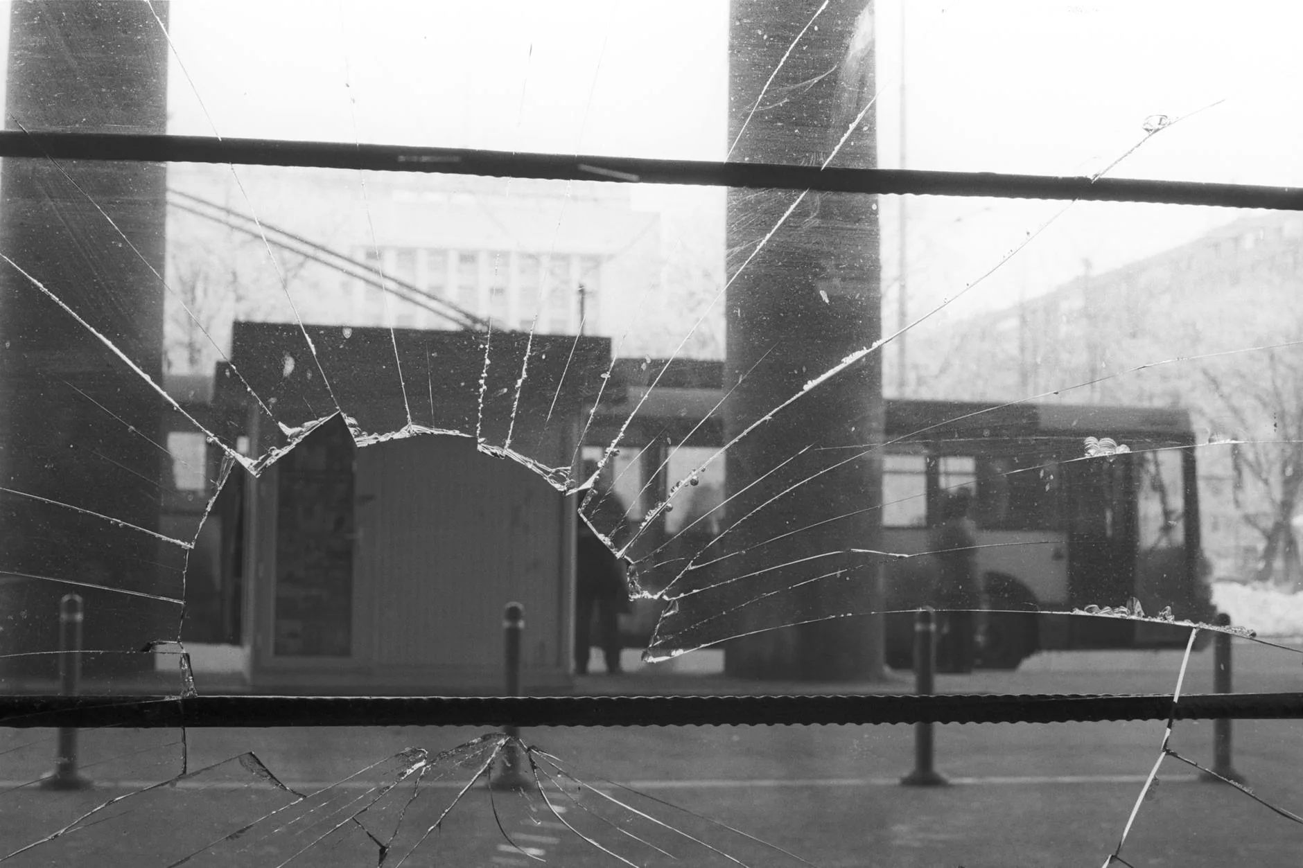 Professional contractor installing a new energy-efficient window in a home to eliminate drafts.